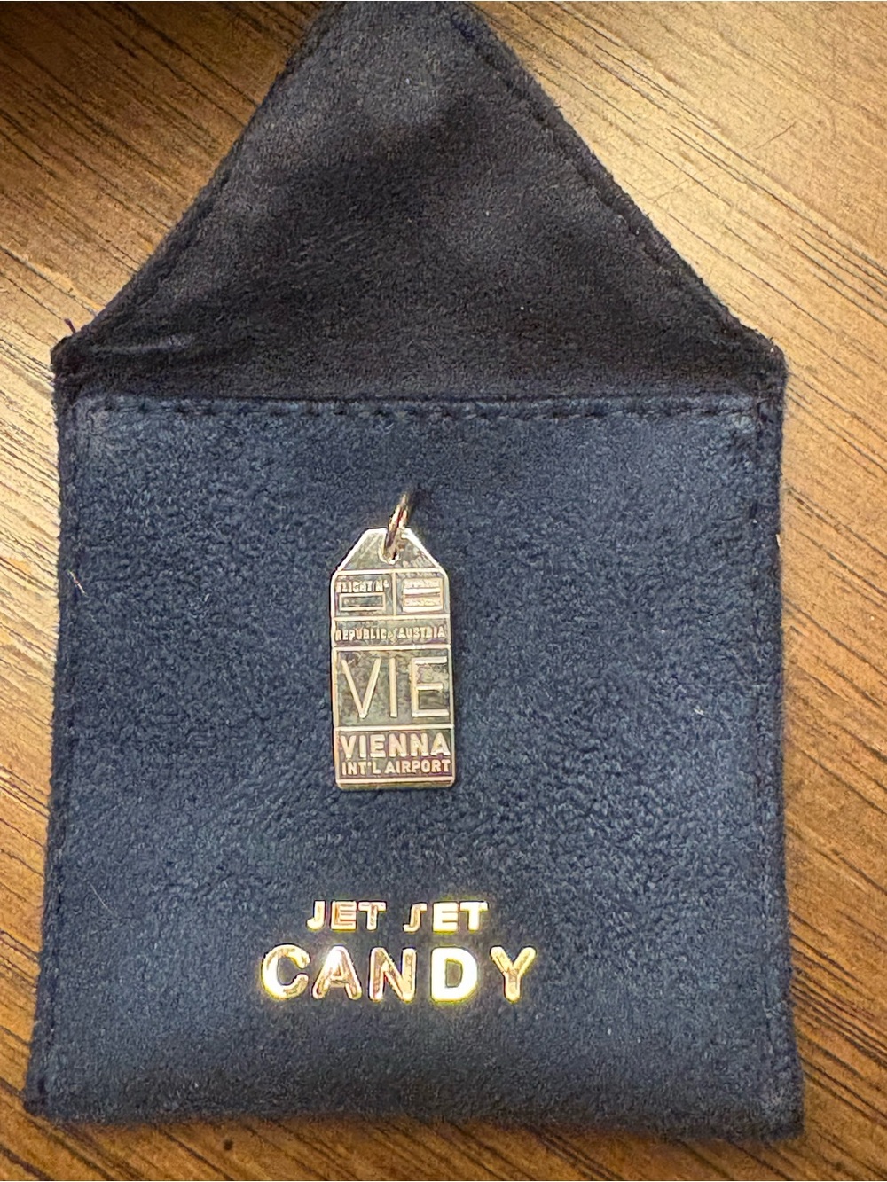 Jet Set Candy Navy Travel Pouch with Vienna VIE Charm